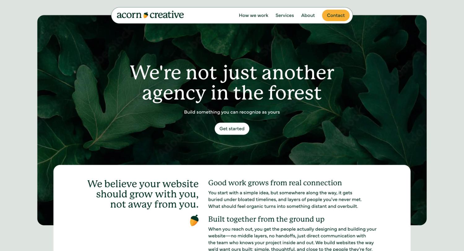 The Acorn Creative homepage, showing the leaf hero and intro card